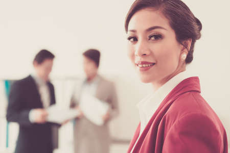 Portrait of attractive business lady smling at cameraの写真素材