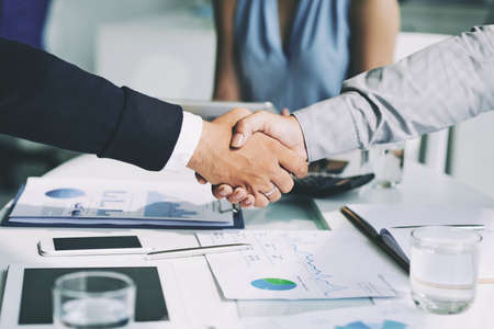 Businessmen shaking hands after successful meetingの写真素材