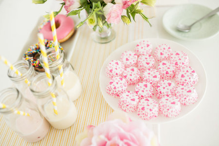 Candies and drinks on table, selective focus