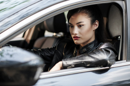 Portrait of woman driver waiting in traffic jams