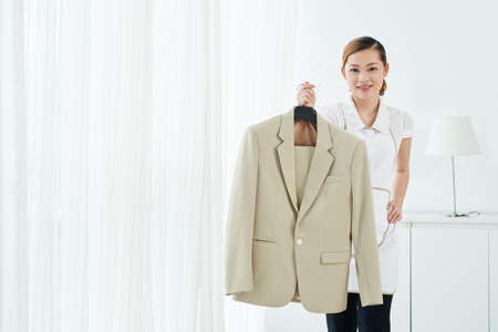 Portrait of pretty maid with fresh clean jacketの写真素材