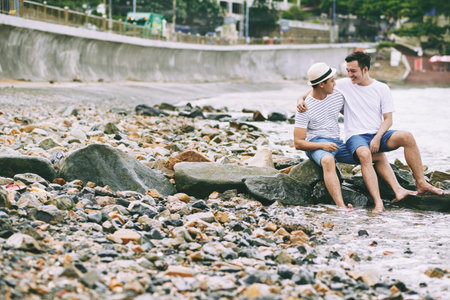 Vietnamese gay couple spending time on resortの写真素材