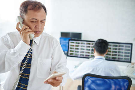 Mature stock brokerの写真素材