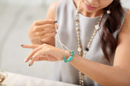 Jewelry designer in process of creation on new pieceの写真素材