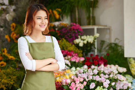 Portrait of Vietnamese female owner of flower shopの写真素材