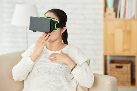 Young woman shocked with virtual reality effects
