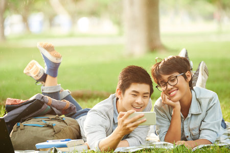 Hanging out with Friend in Parkの写真素材