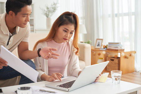 Young Asian Couple at Home