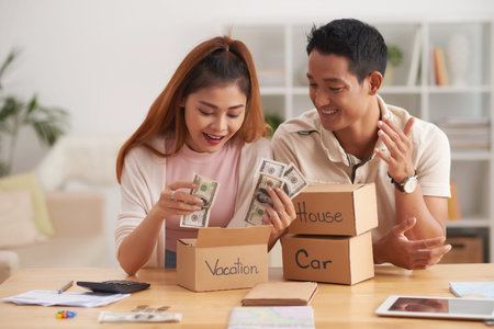 Happy Couple Saving Money