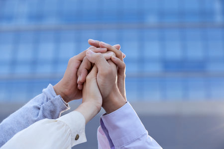 Clasping hands