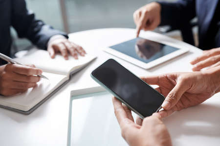 Using application on smartphoneの写真素材