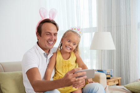 Taking funny selfiesの写真素材