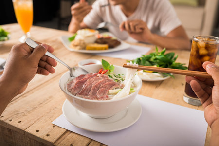 Family enjoying tasty soup