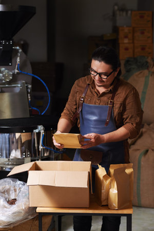 Packing coffee for sellingの写真素材