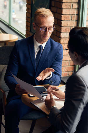 Discussing business documentsの写真素材
