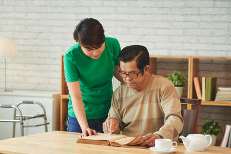 Showing interesting articleの写真素材