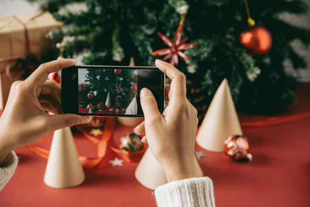Taking photo of decorationの写真素材