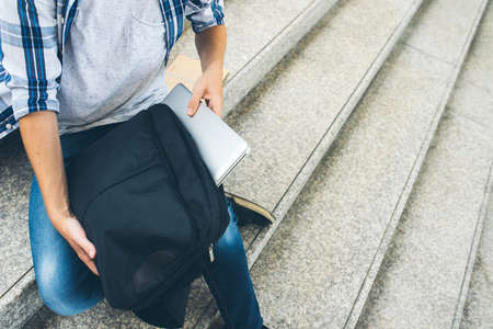 Laptop into backpackの写真素材