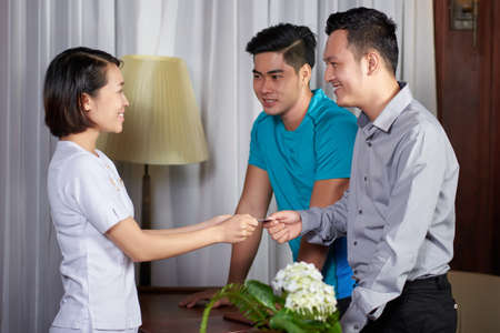 Paying for the roomの写真素材