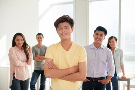 Young man leading a group