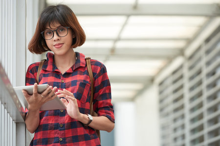 Young lady using mobile app