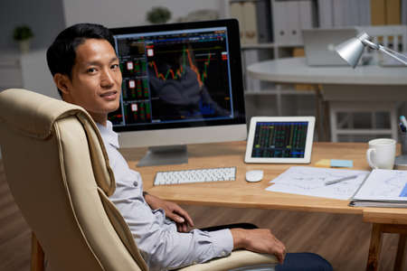 Financial analyst working with data from stock marketの写真素材