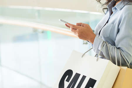 Texting shopperの写真素材