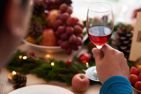 Drinking red wineの写真素材