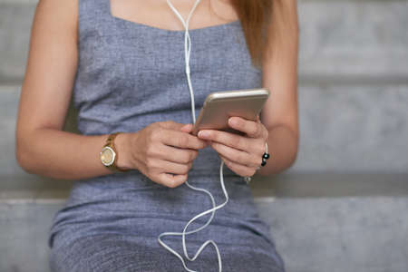 Business lady using mobile appの写真素材