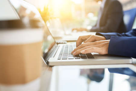 Computing busienss womanの写真素材