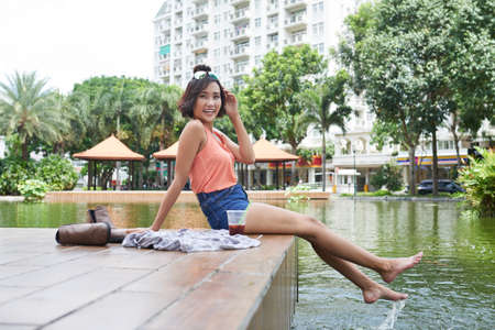 Having fun by poolの写真素材