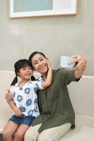 Selfie with granddaughterの写真素材
