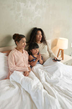 Watching tv in the morningの写真素材