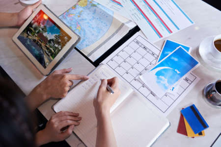 Loving Couple Planning Vacation Tripの写真素材