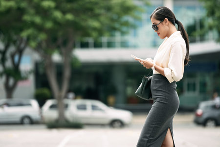 Woman using mobile appの写真素材