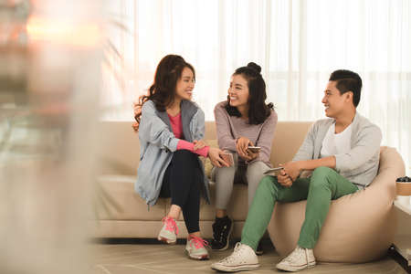 Friends at homeの写真素材