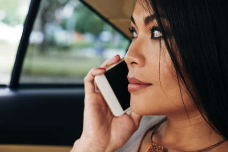 Woman having phone talkの写真素材