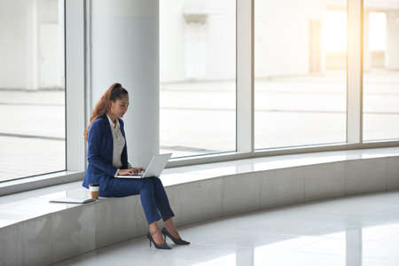 Checking e-mailsの写真素材