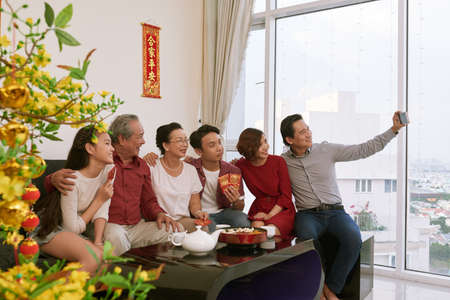 Family celebrating spring festivalの写真素材