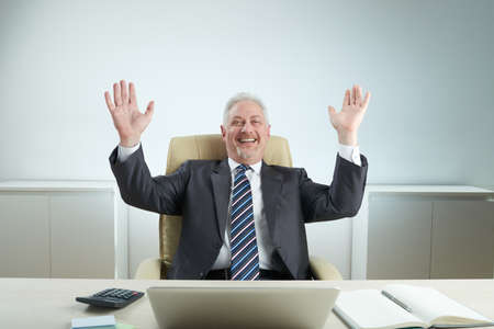 Cheerful Manager Celebrating Successの写真素材