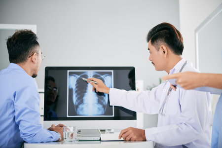 Showing x-ray to patient