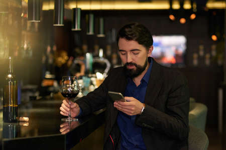 Enjoying evening in a barの写真素材