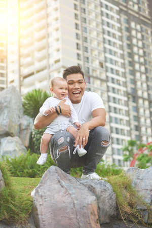 Cheerful father and kidの写真素材