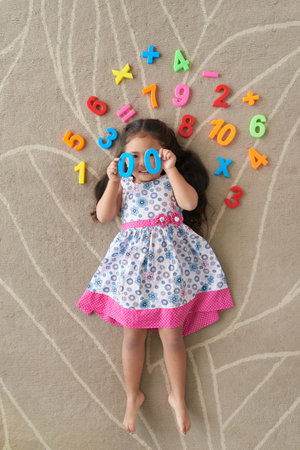 Girl playing with toysの写真素材