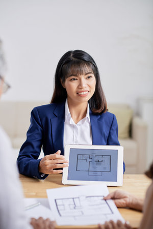 Pretty Interior Designer Having Meeting