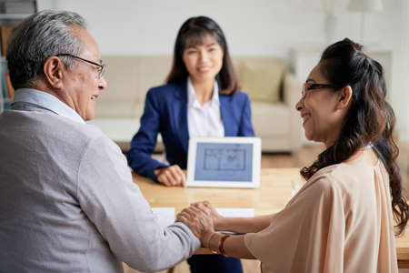 Affectionate Couple Choosing New Apartmentの写真素材