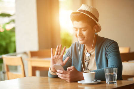 Videocalling young manの写真素材