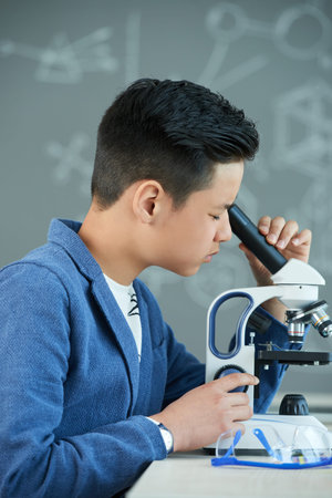 Young Researcher Wrapped up in Work