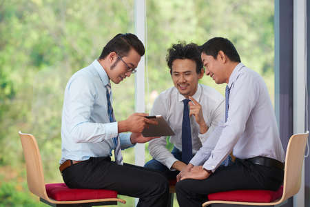 Sharing idea on tablet screenの写真素材