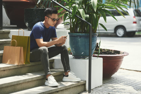 Texting young man